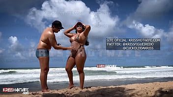 play Males Get Hard On The Beach Because Of Kriss Hotwife's Tiny Bikini That Leaves All Pussy Out